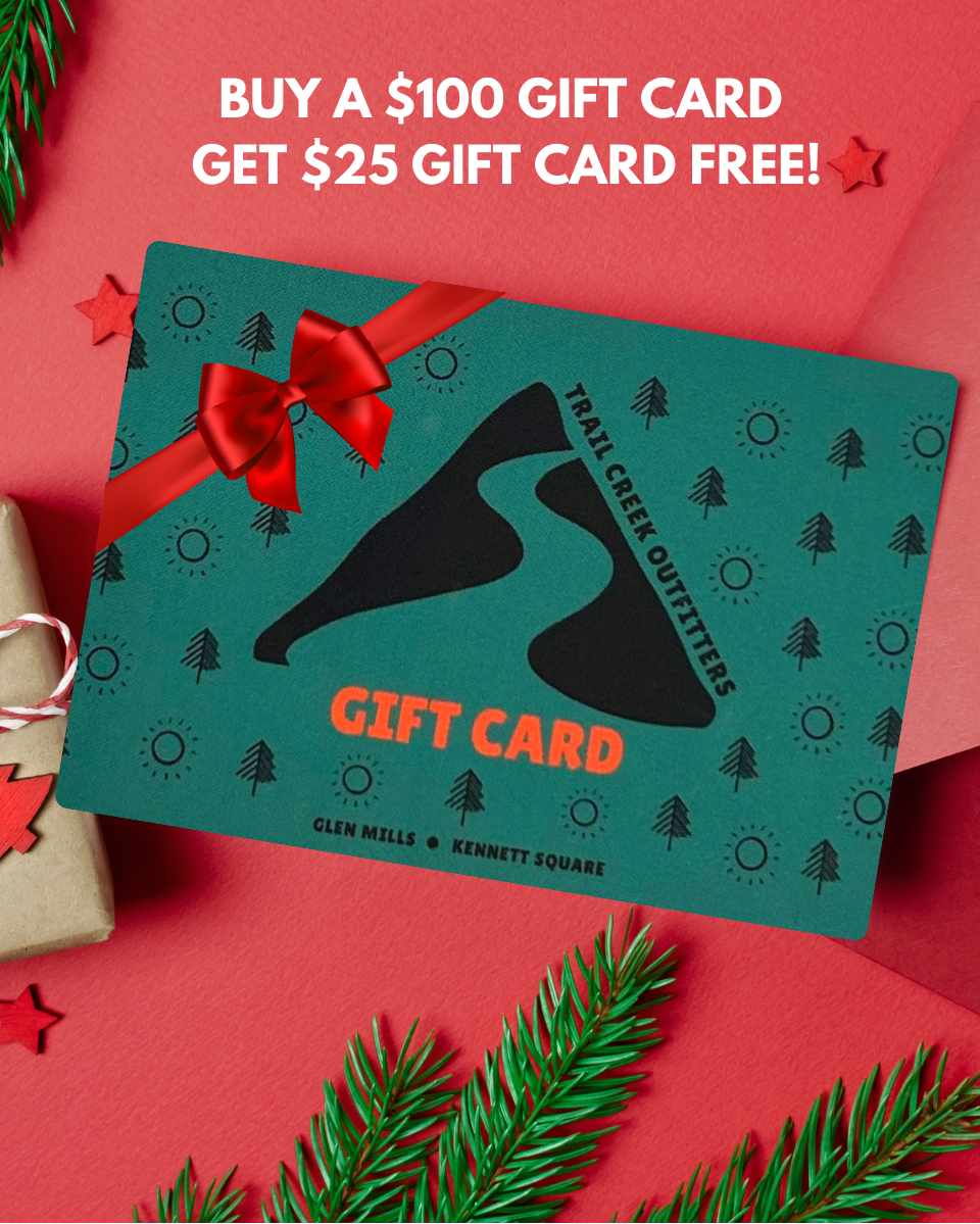 Gift card with red bow on a red background with Christmas elements